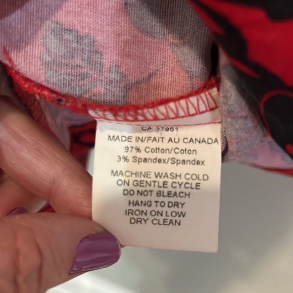 Cute strapless a-line mini dress. Red with black flowers and ties at the back. - Picture 4 of 4